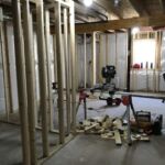 Before buildout. Unfinished basement needed room separations, insulation and doors.