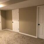 Brand new doors create a separation between rooms and garage.
