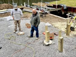Now The Real Building Begins as Wooden Beams connect to the Concrete Posts.